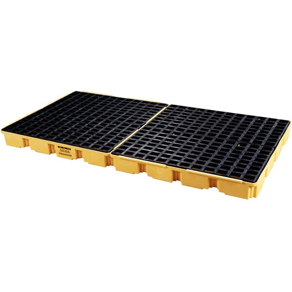 A yellow and black Eagle Manufacturing spill platform for 8 drums.