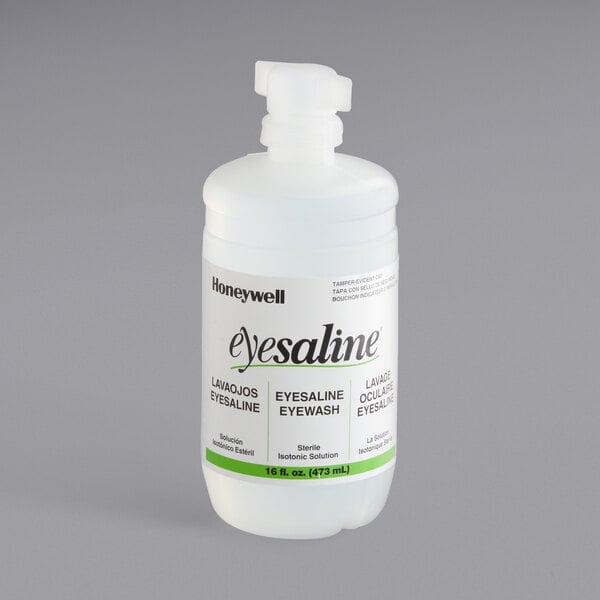 A white Honeywell Eyesaline 16 oz. personal eyewash bottle.