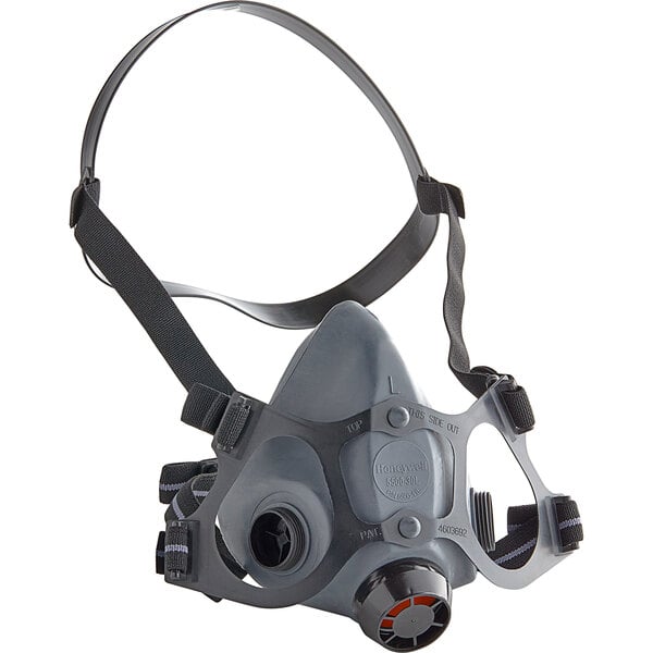 A grey Honeywell North 5500 Series half mask with black straps.