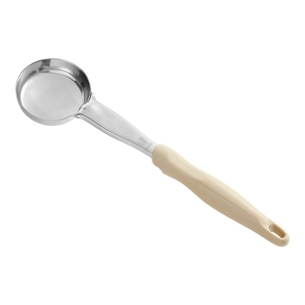 A close-up of a Vollrath ivory round portion spoon with a wooden handle.