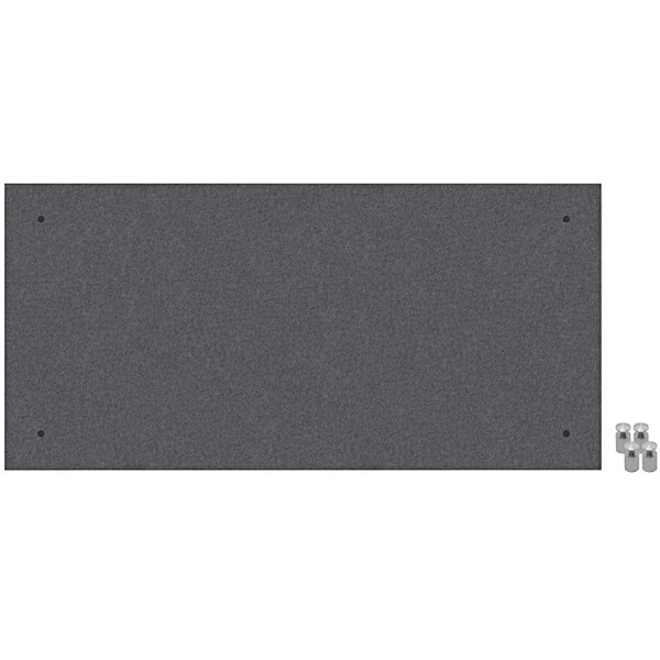 A dark gray rectangular Versare SoundSorb panel with screws on a table.