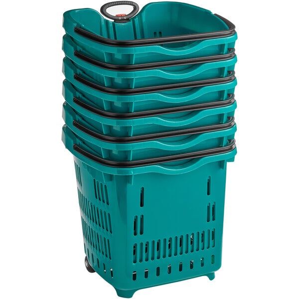 A stack of green plastic shopping baskets.
