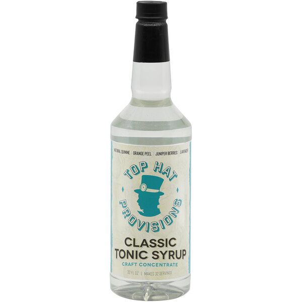 A clear bottle of Top Hat Provisions Classic Tonic 5:1 Concentrate with a label.