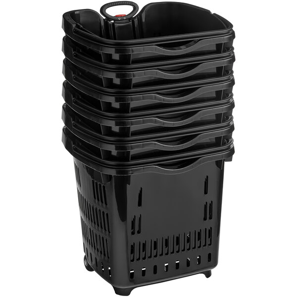 A stack of black Regency plastic baskets with wheels.