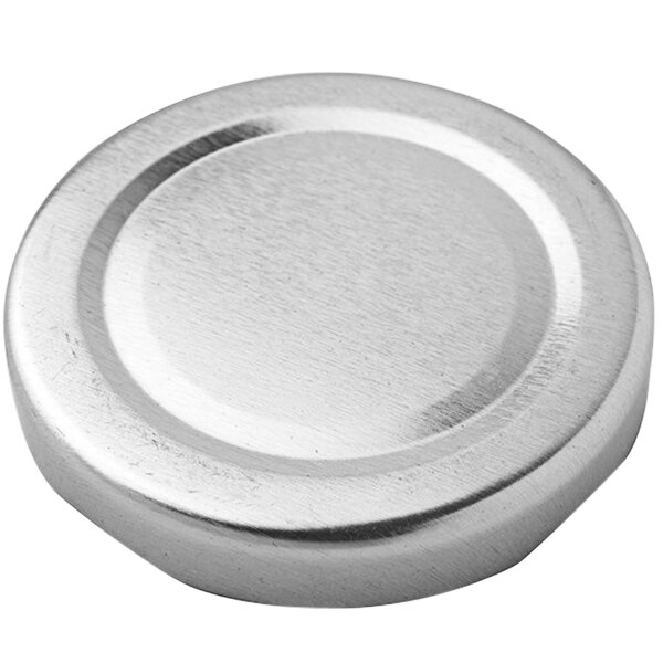 a silver circle object with a white background