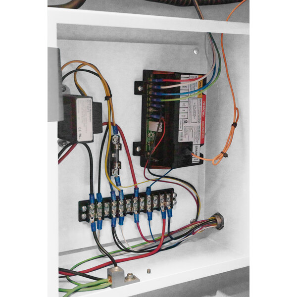 The wiring panel of a Primo RAVEN-Xr15 coffee roaster.