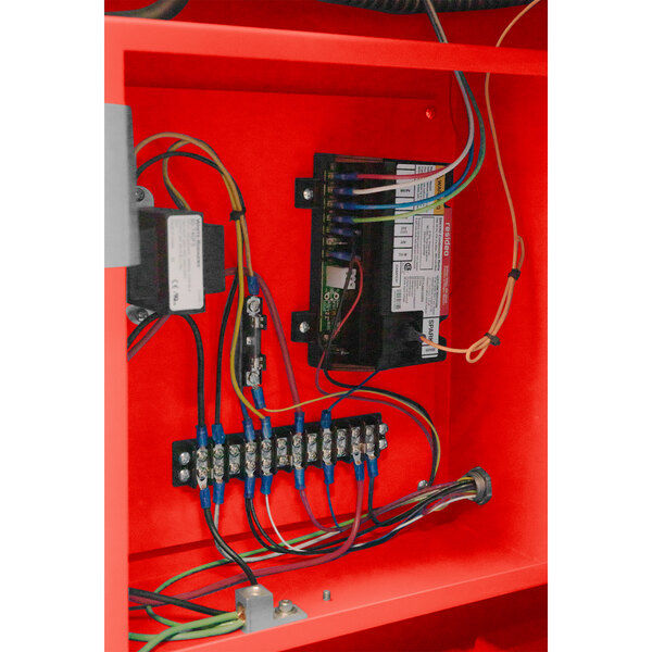 A close-up of the red Primo RAVEN-X coffee roaster with wires inside.