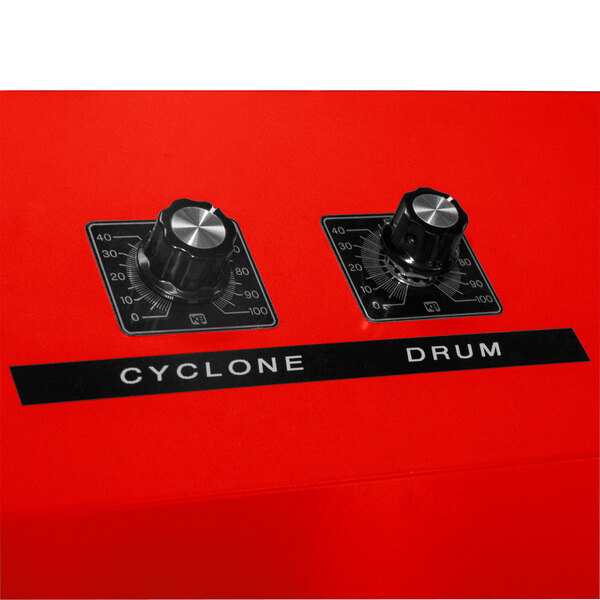 A close-up of a black and silver knob on the Primo RAVEN-Xr15 coffee roaster.