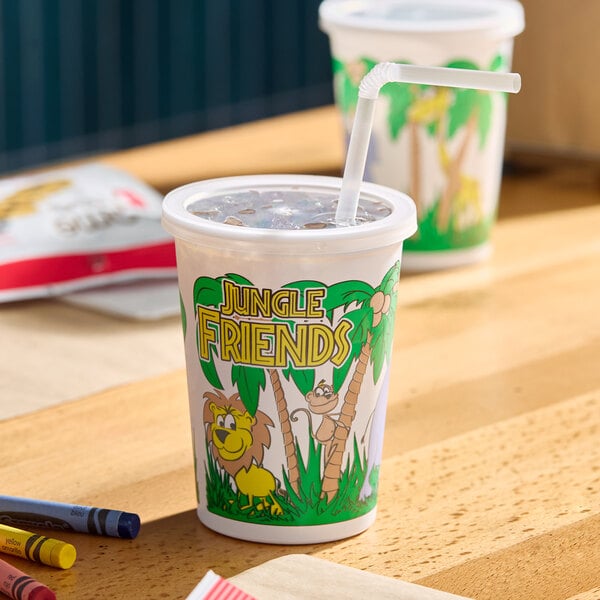 A 12 oz. kid's cup with a jungle print design, lid, and straw.