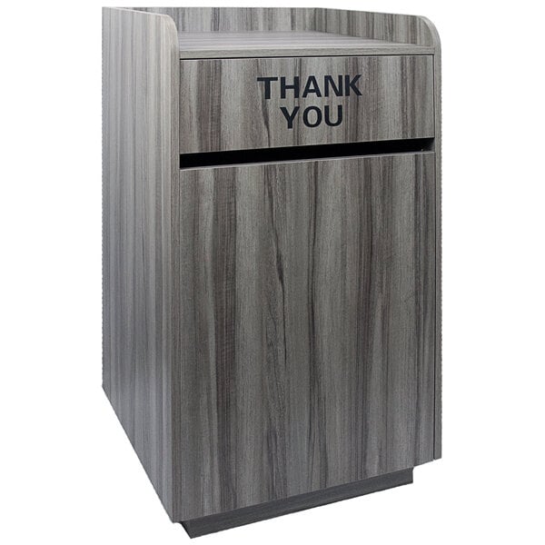 An American Tables & Seating gray faux wood melamine receptacle enclosure with a "THANK YOU" swing door.