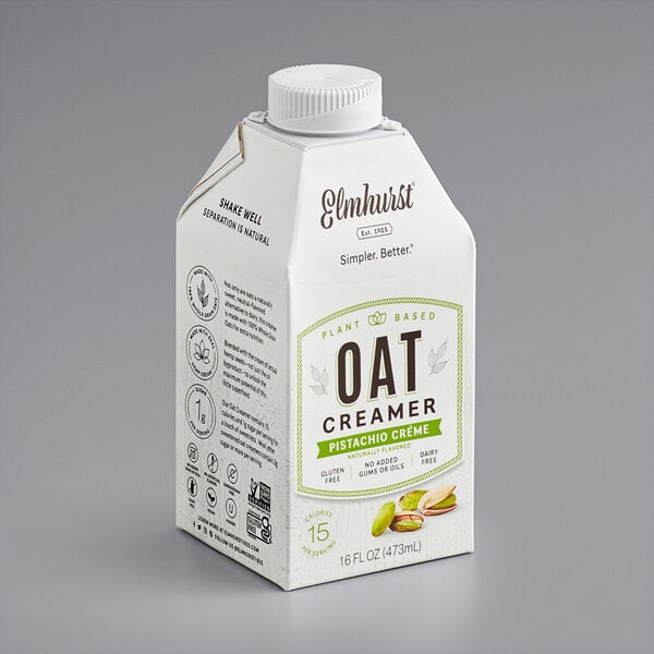 A carton of Elmhurst Pistachio Creme Oat Creamer on a white background.