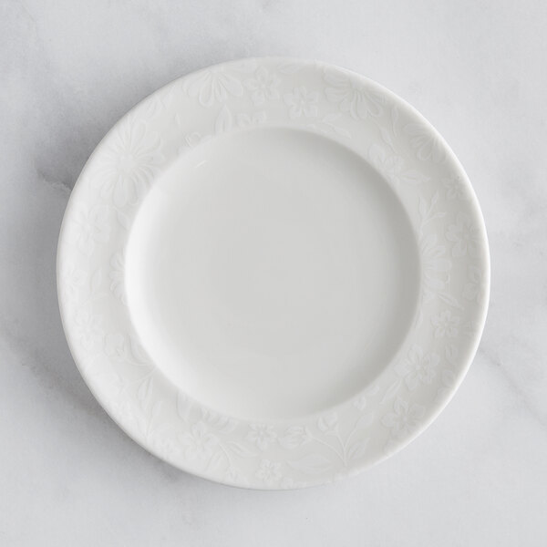 a white plate with a floral design