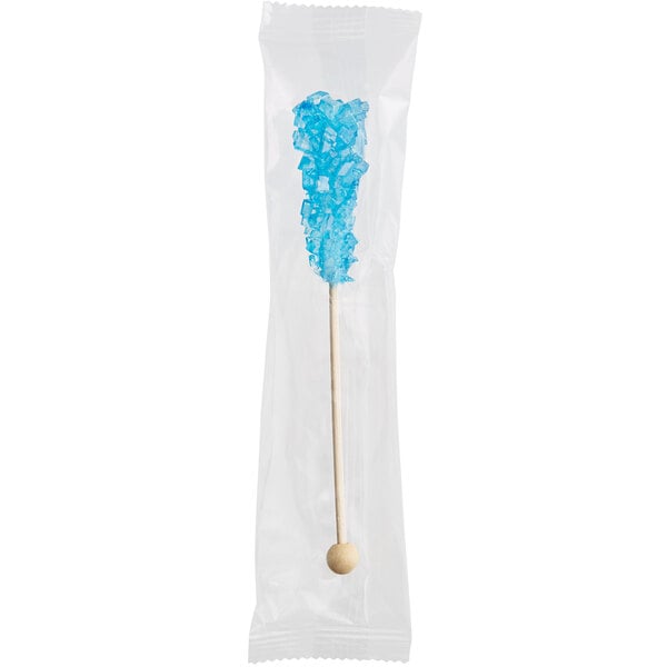 A Roses Dryden and Palmer blue raspberry rock candy swizzle stick in a clear plastic bag.