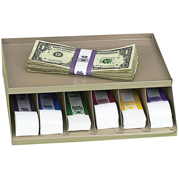 A Controltek USA metal coin and bill rack holding rolled money with a purple band.