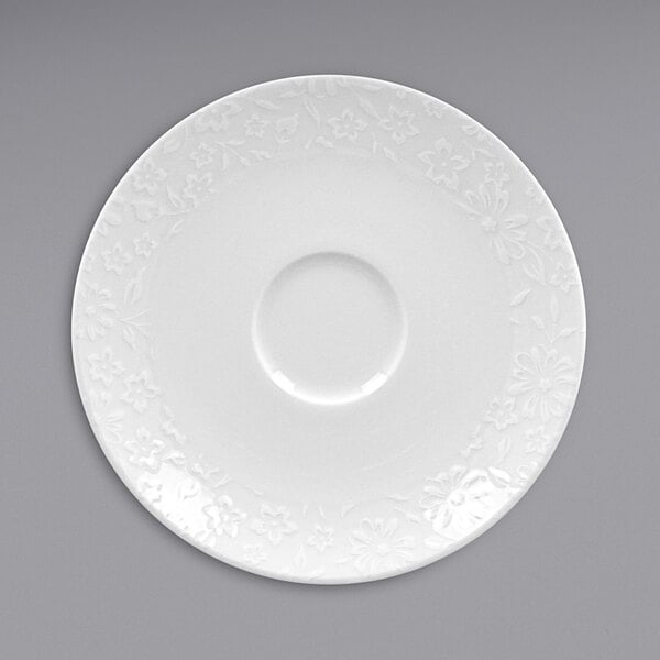 a white plate with a circle in the middle