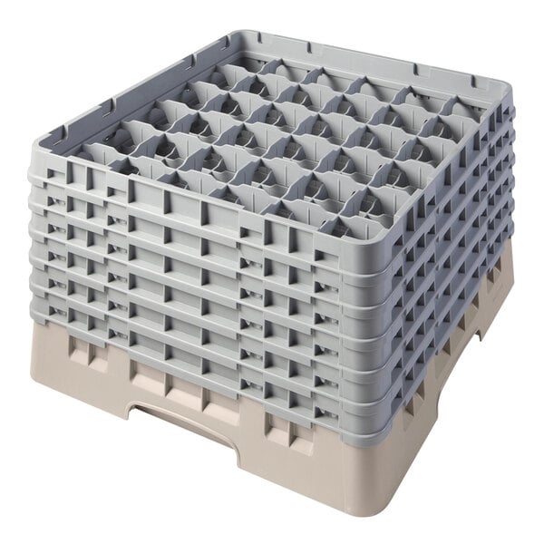 A beige plastic Cambro glass rack with 36 compartments and 5 extenders.