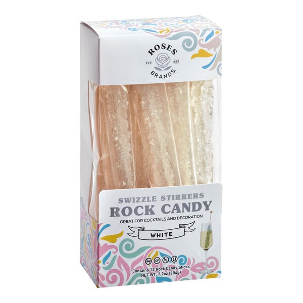 A white box of Roses Dryden and Palmer rock candy swizzle sticks.