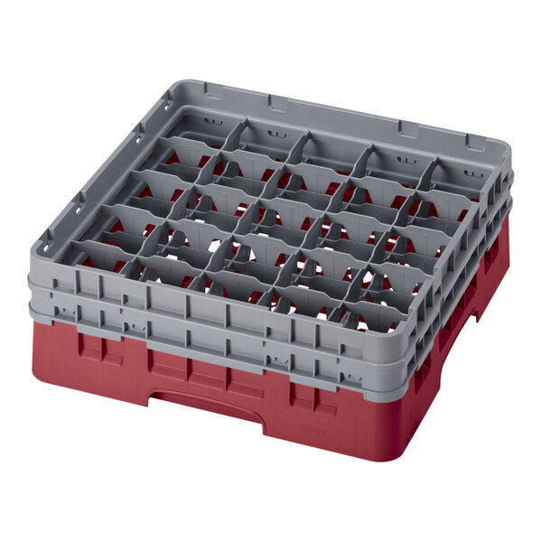 A red and grey plastic Cambro glass rack with 25 compartments.