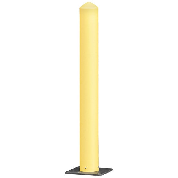 A yellow cylindrical Eagle Manufacturing Safety Bollard Post with a black base.