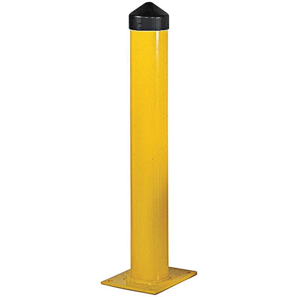 A yellow rectangular Eagle Manufacturing safety bollard post with a black cap on top.