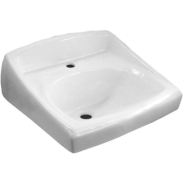 A white vitreous china Sloan wall mounted lavatory with a center hole.