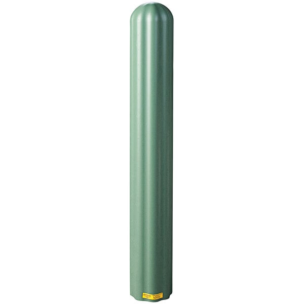 A green cylindrical Eagle Manufacturing bollard cover with fluted metal and a yellow label.