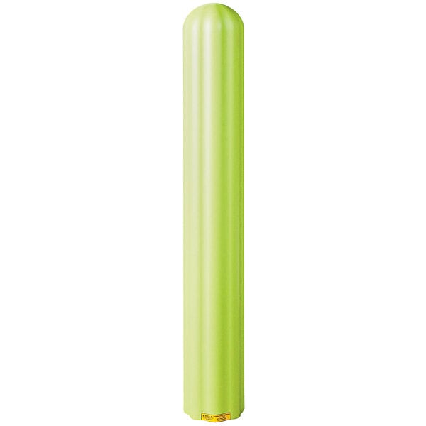 A lime green fluted plastic cover for a safety bollard.