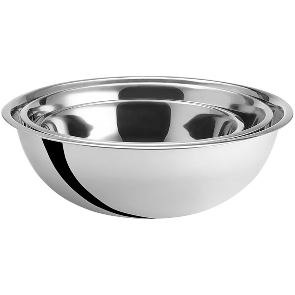 A set of three silver stainless steel mixing bowls on a white background.