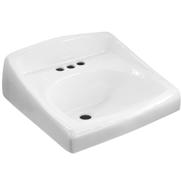 A white square Sloan wall mounted sink with 3 holes.