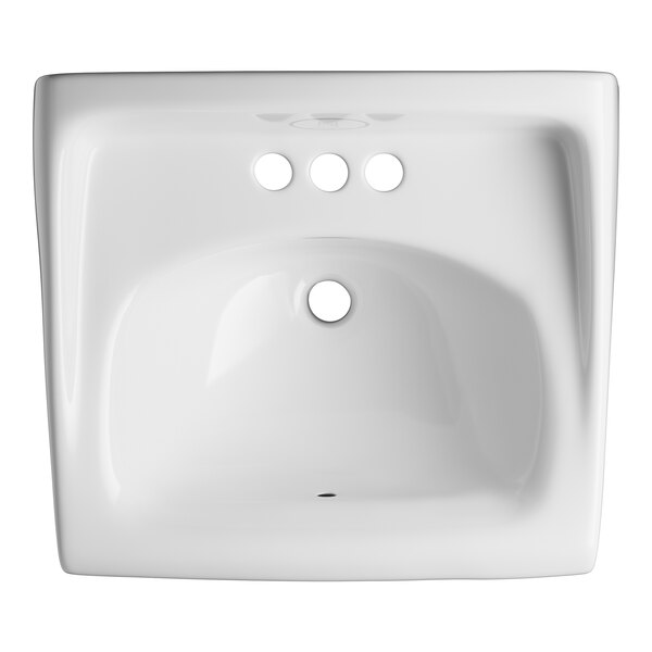 A white vitreous china wall mounted Sloan lavatory with three holes.