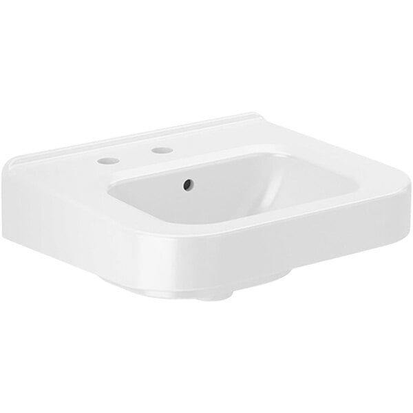 A white Sloan wall mounted sink with a left side soap hole.