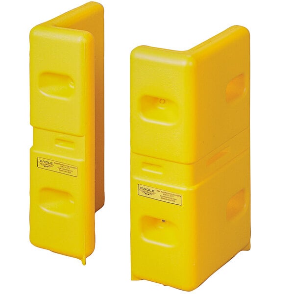 Two yellow plastic Eagle Manufacturing corner protectors with labels.