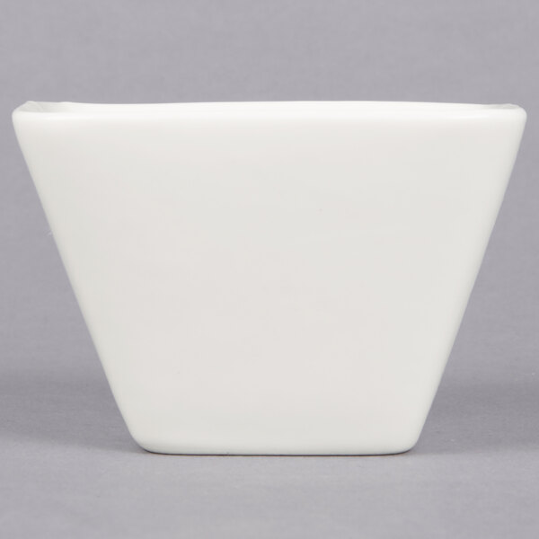 An American Metalcraft white square porcelain sauce cup.