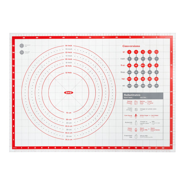 A rectangular silicone pastry mat with red measurement markings, concentric circles, conversion charts, and substitution guides printed on its surface.