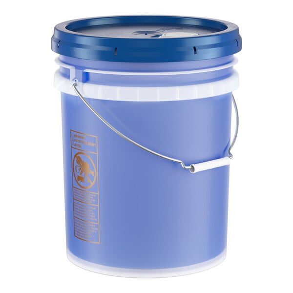 A blue 5-gallon plastic pail with a handle and lid, containing low temperature concentrated dish washing machine rinse aid.