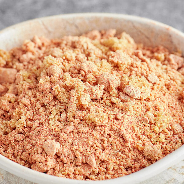 A bowl of brown powdered Regal Brown Sugar Wing Rub.