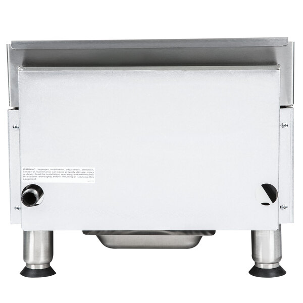 A stainless steel APW Wyott CharRock charbroiler with a white label.