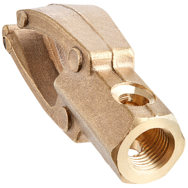 a gold metal object with a nut