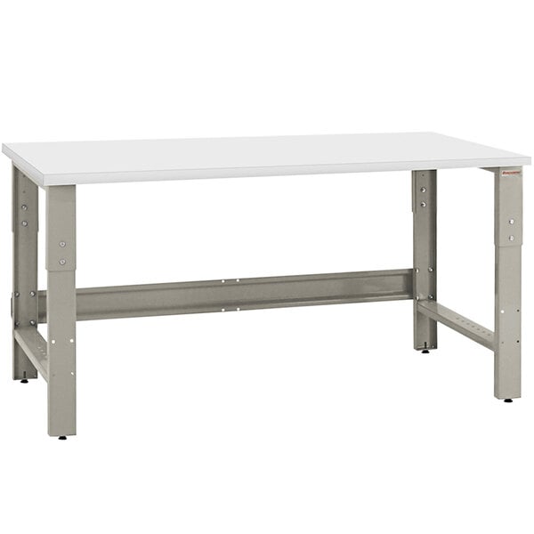 A white rectangular workbench with metal legs.