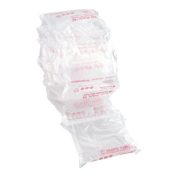 A roll of clear air cushion packaging film with printed text, used for protective packing.