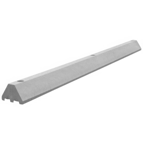 A grey concrete parking block with channels.