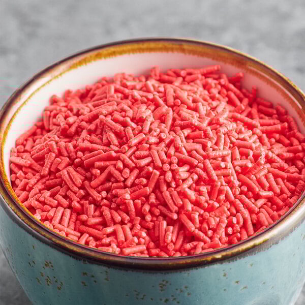 A bowl of Bake-Stable Red Sprinkles.