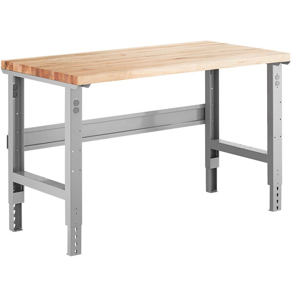 A Lavex workbench with a maple top and metal legs.