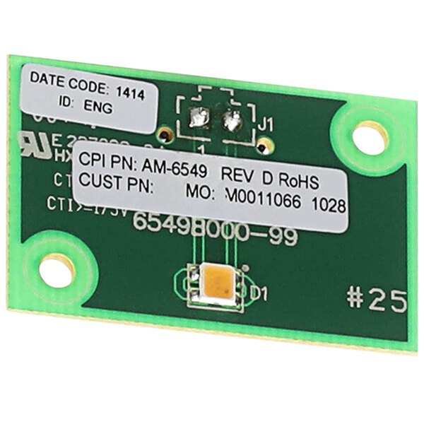 A green circuit board with a white label and text.