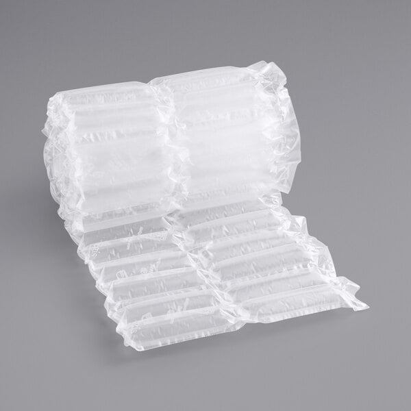 A clear plastic roll of Pregis AirSpeed Supertube Film with bubble wrap inside.