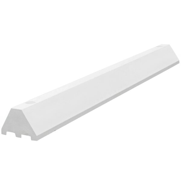 A long white rectangular Plastics-R-Unique parking block with channels.
