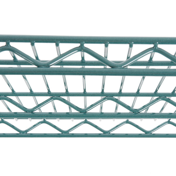 A close-up of a Metro Super Erecta wire shelf with a white background.