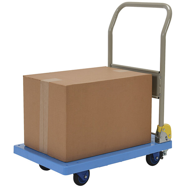 A Vestil blue plastic platform truck with a large cardboard box on it.