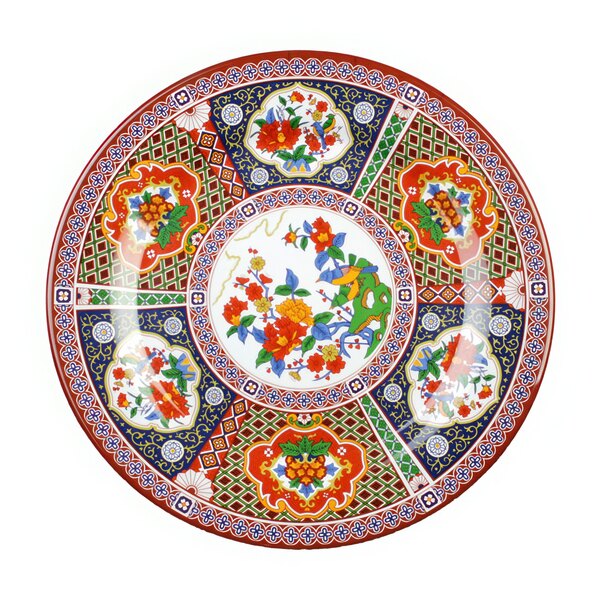 A close-up of a Thunder Group Peacock melamine plate with flowers and birds in colorful designs.