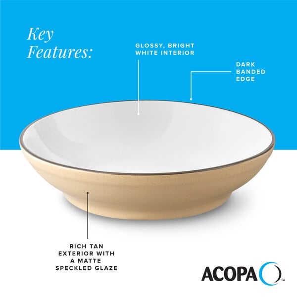 A tan matte stoneware pasta bowl with a glossy white interior and a dark banded edge.